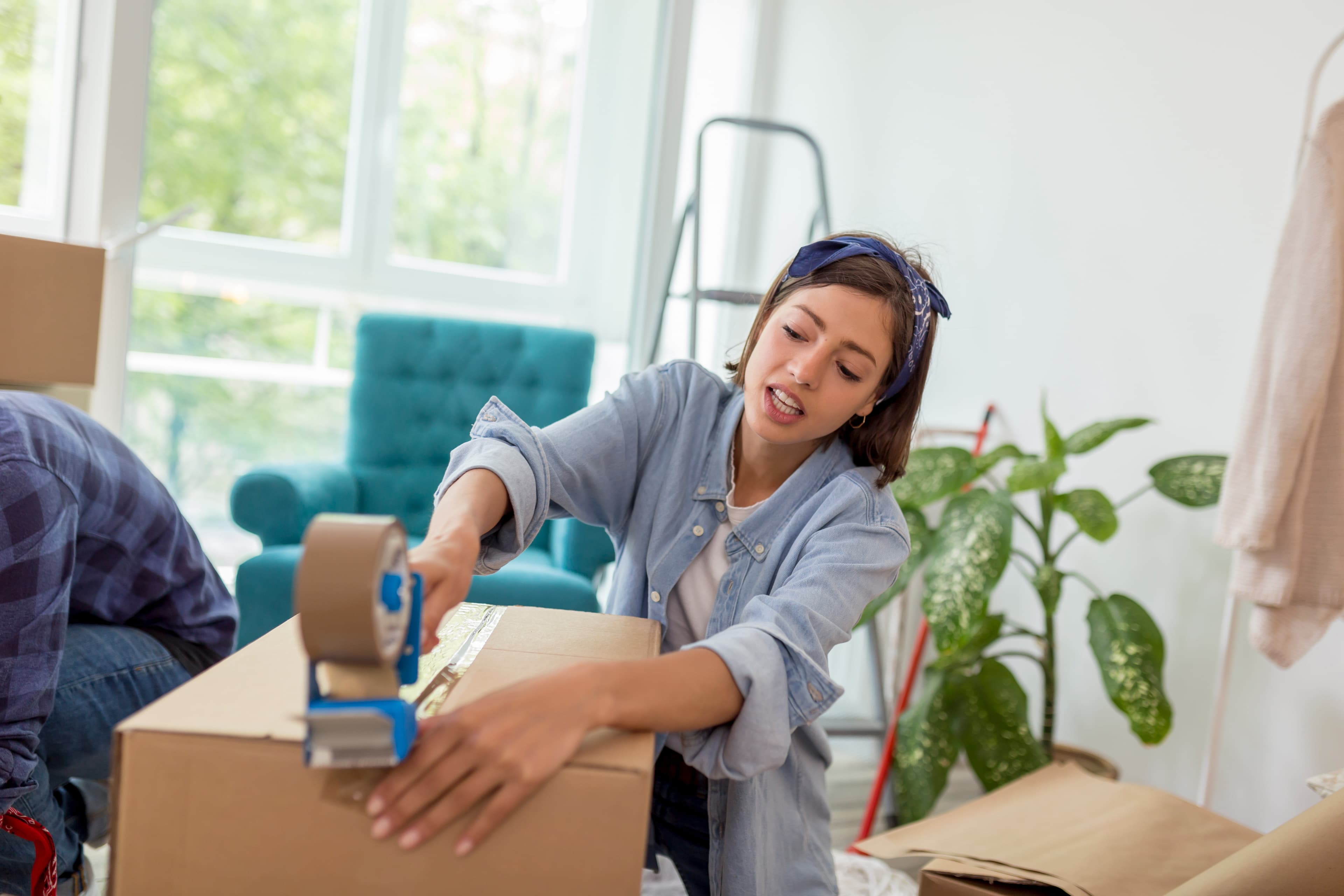 Flat Fee Moving team handling furniture — transparent pricing